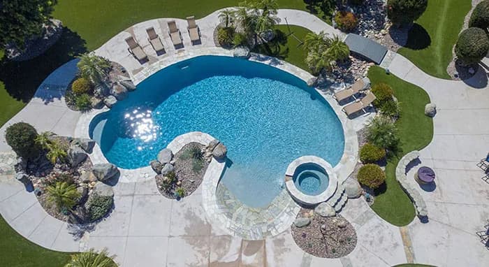 StoneScapes Mini Pebbles: Aqua Blue Mini — water color and installed finish