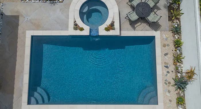 StoneScapes Puerto Rico Blend Small: Aqua Blue Small — water color and installed finish