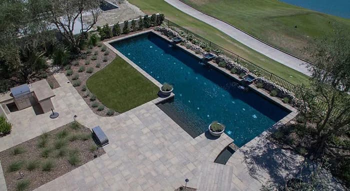 StoneScapes Mini Pebbles: Black Mini — water color and installed finish