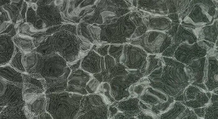 StoneScapes Mini Pebbles: Cameroon Mini — water color and installed finish