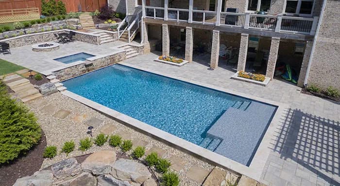 StoneScapes Mini Pebbles: French Gray Mini — water color and installed finish