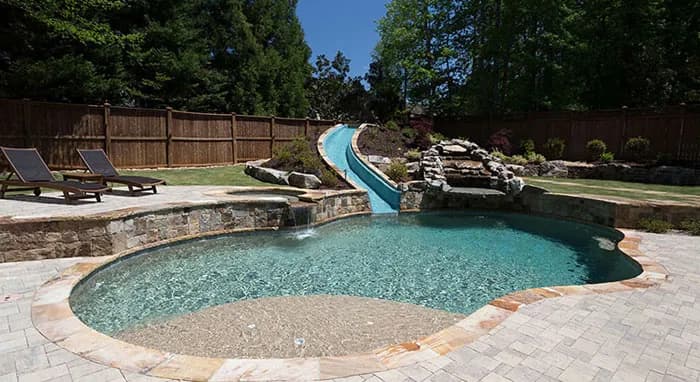 StoneScapes Regular Pebbles: Sand — water color and installed finish