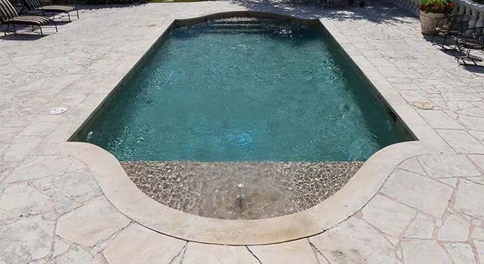 StoneScapes Puerto Rico Blend Large: Sand Large — water color and installed finish