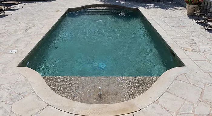 StoneScapes Puerto Rico Blend Small: Sand Small — water color and installed finish