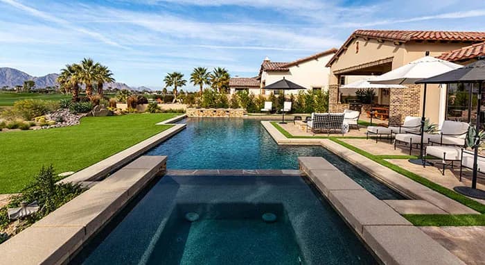 StoneScapes Regular Pebbles: Tropics Blue — water color and installed finish