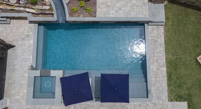 StoneScapes Puerto Rico Blend Large: Tropics Blue Large — water color and installed finish