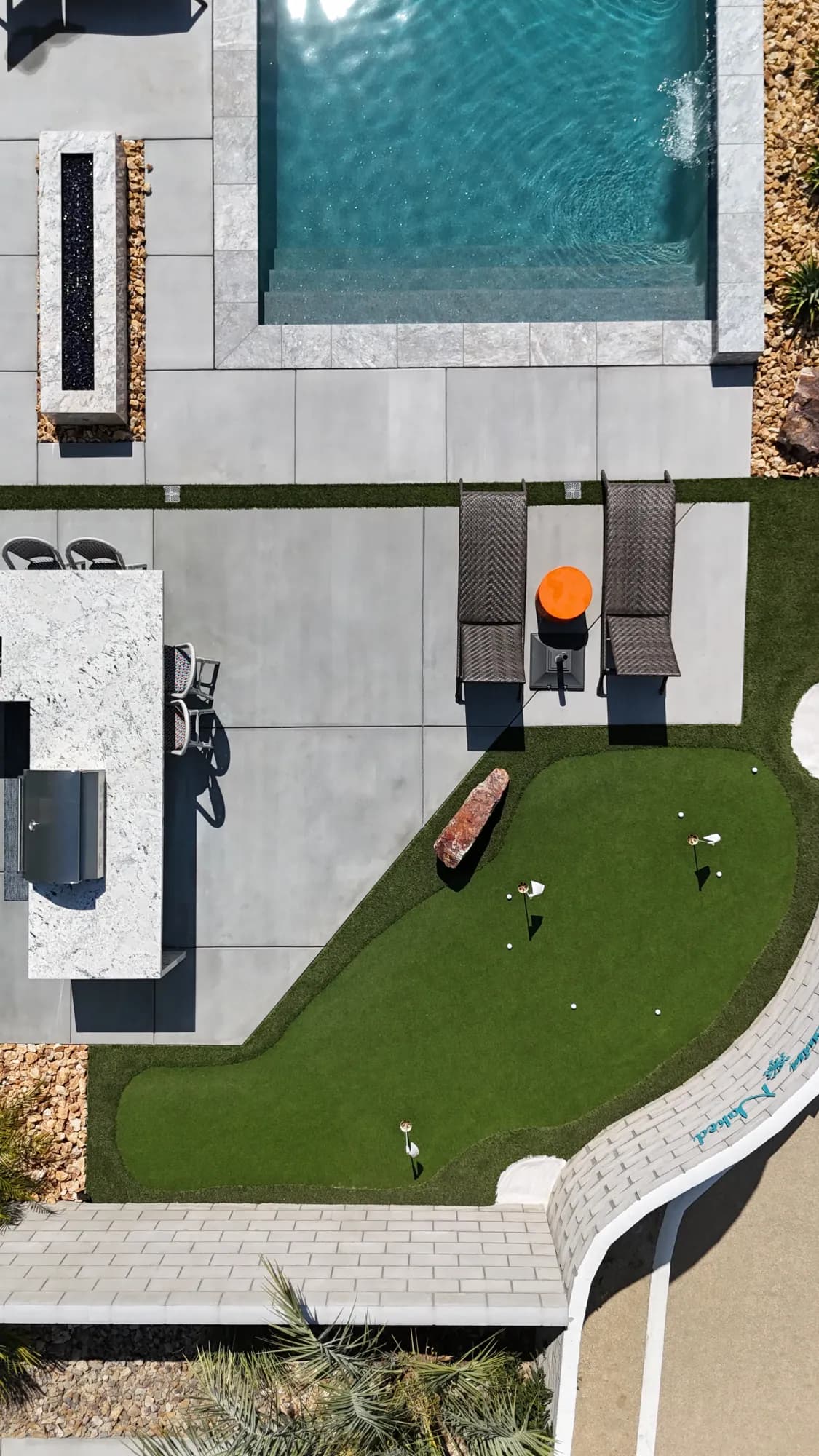 Renovated pool with contemporary tile and decking by JB Pools